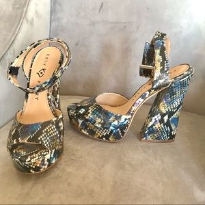 SNAKESKIN PLATFORM HEELS